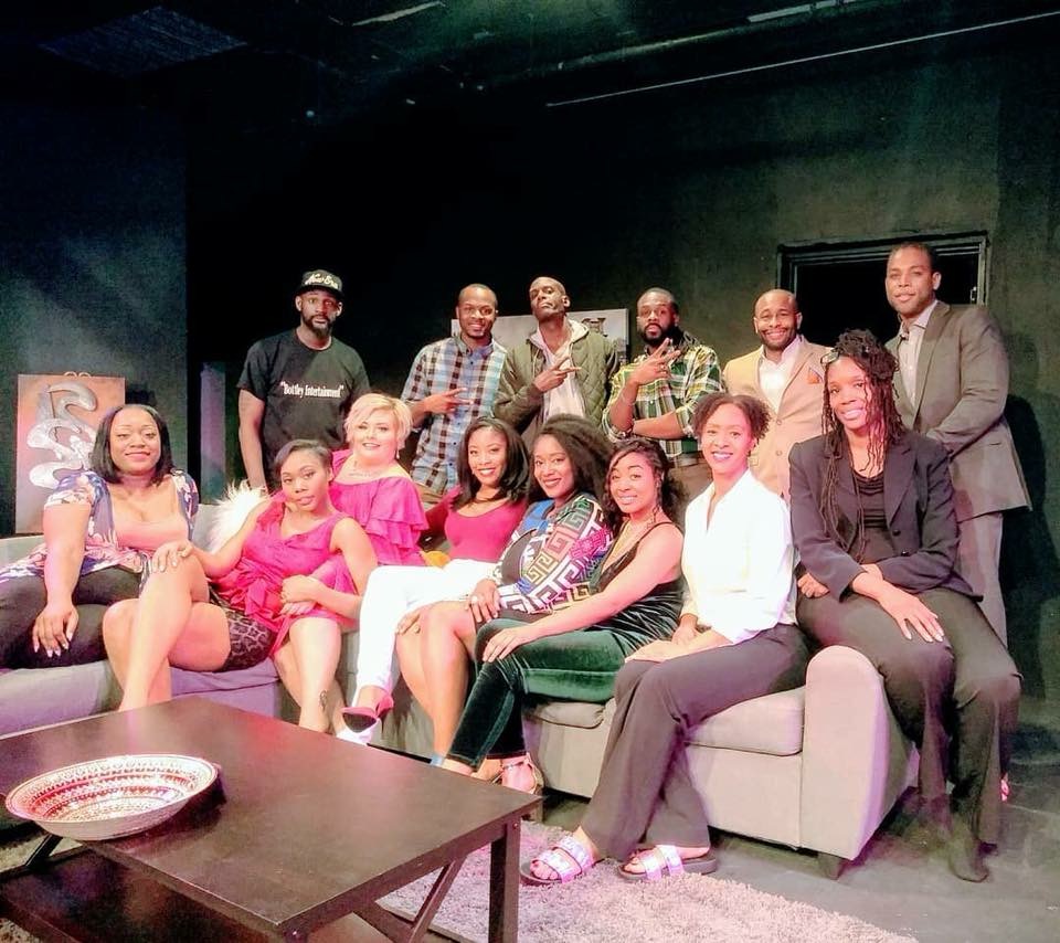 Cast group on stage set